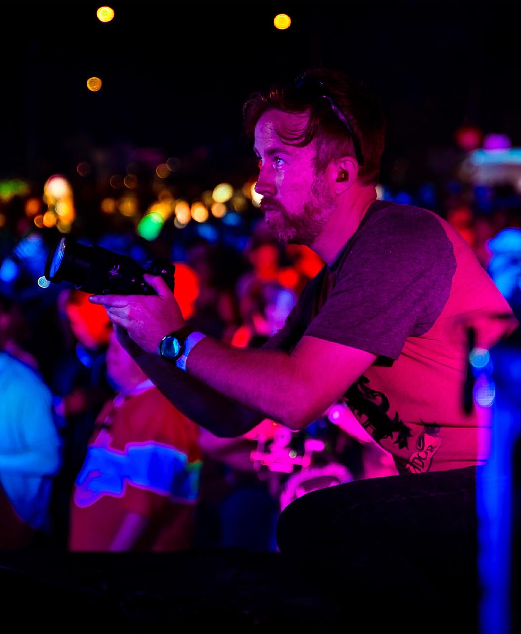 Jason Lobdell of Knightwing Media taking photos at concert